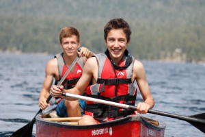 Two kids on canoe